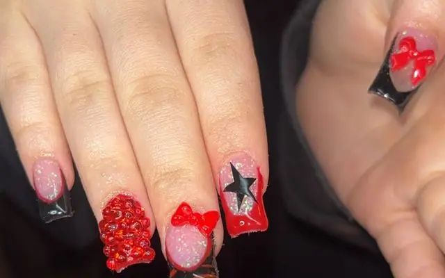 A long set by Jade, red and black with gems and tiger stripes